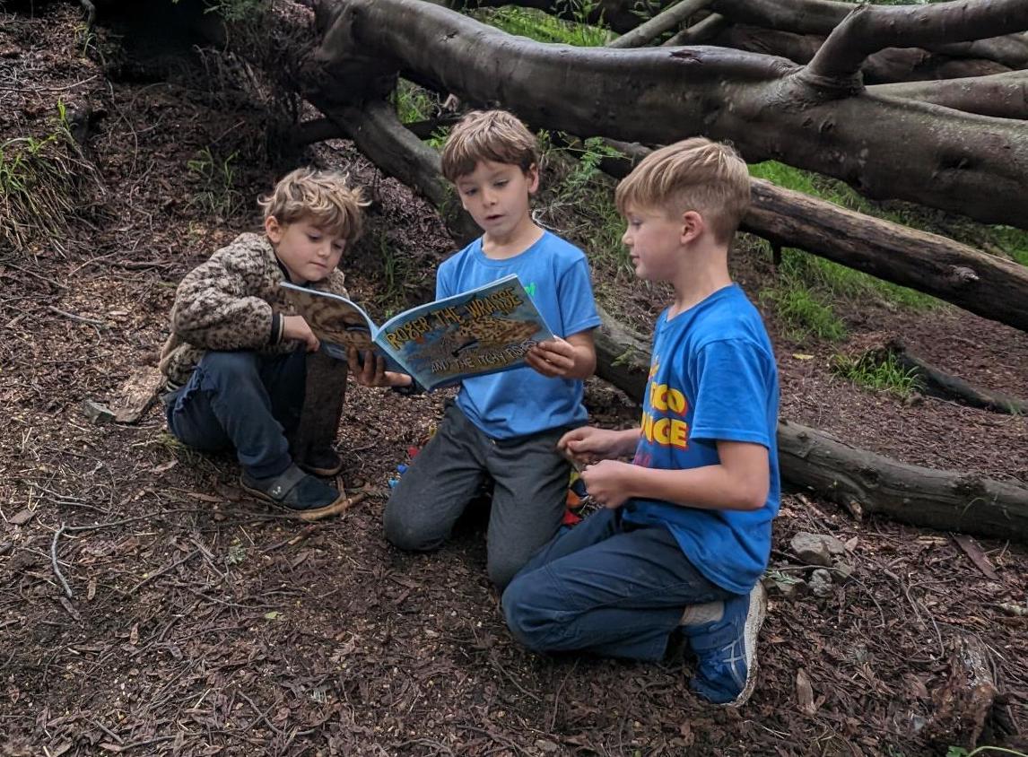 Boys exploring books_nature_